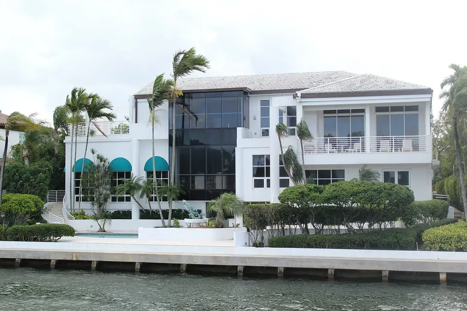 A modern waterfront home with a pool on a Miami waterway